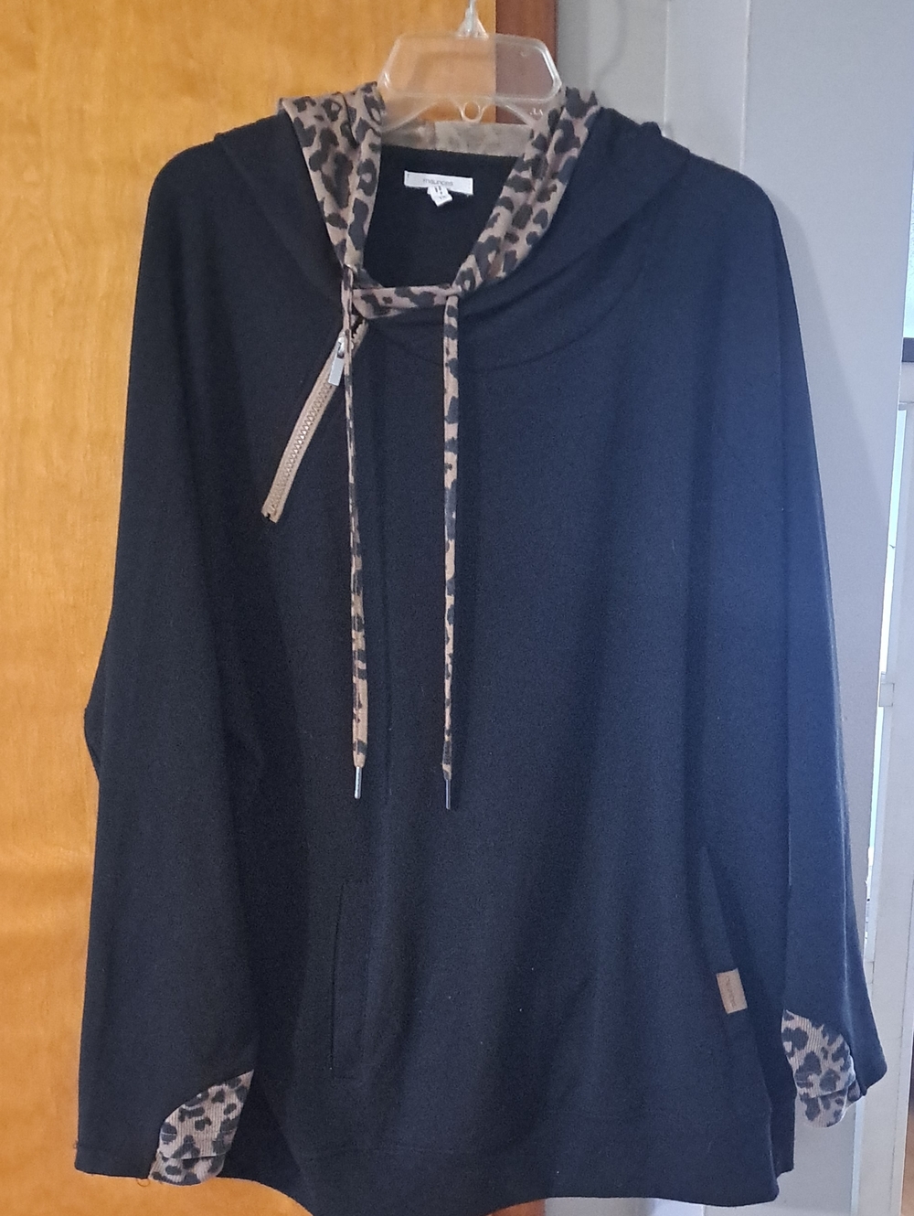 Maurices Black Pullover Hoodie with Leopard Trim, Sleeves and Hoodie.